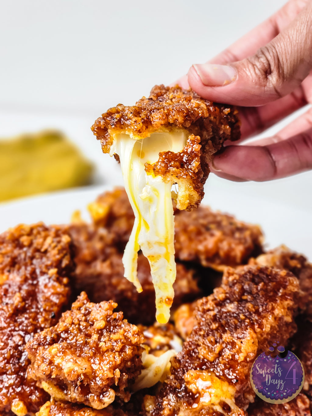Copycat Chilis Nashville Hot Mozzarella Sticks on White