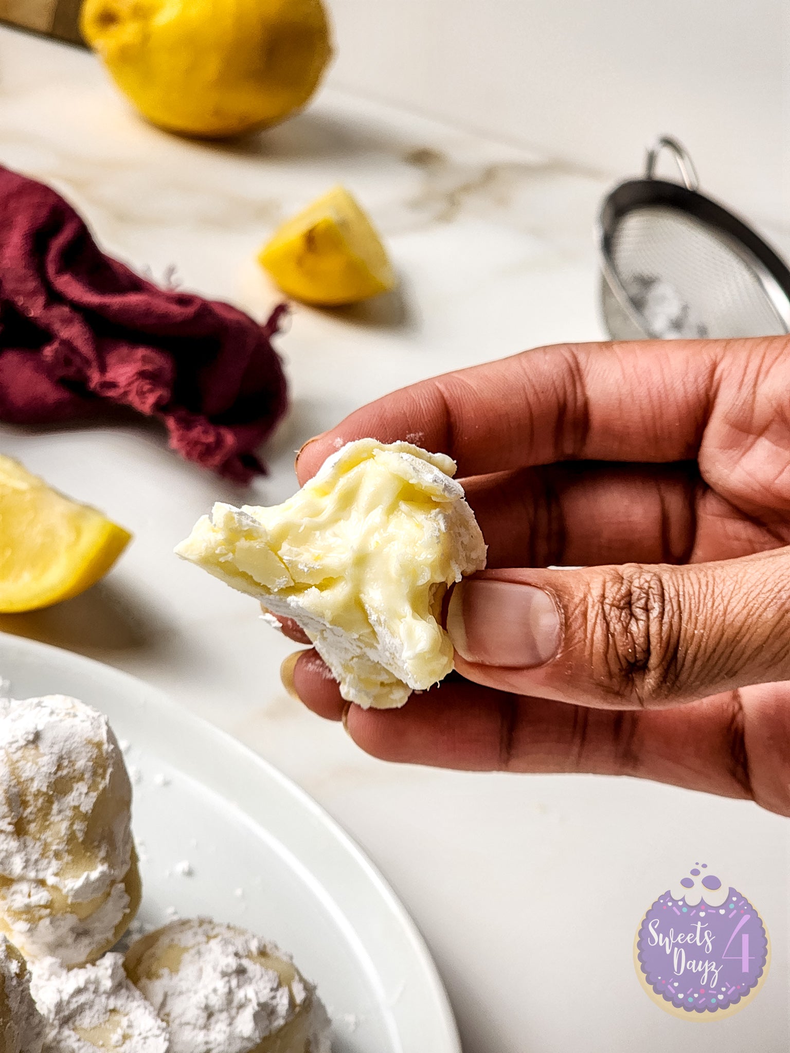 Lemon Bar Truffles on Gold Marble