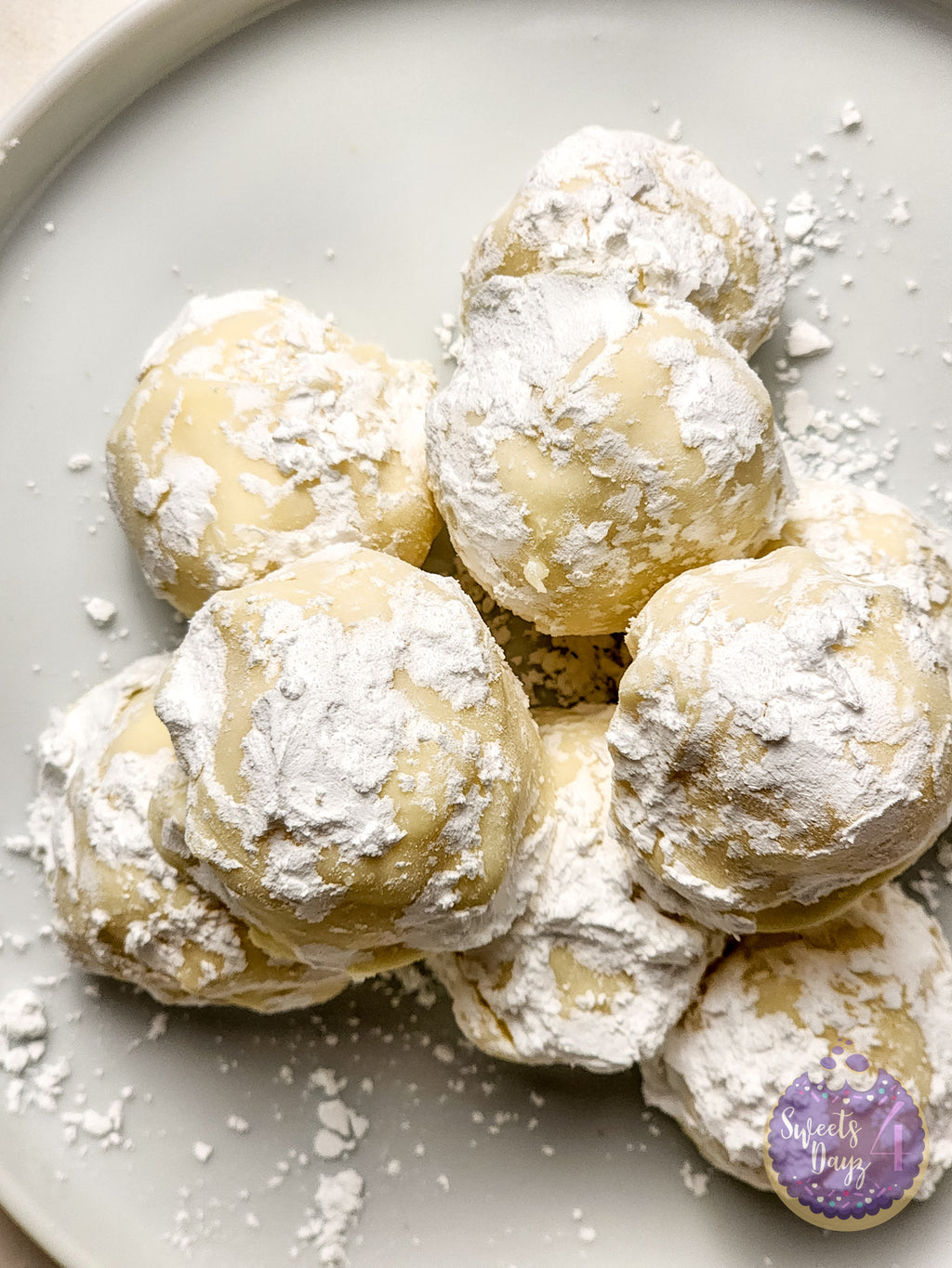Lemon Bar Truffles on Gold Marble