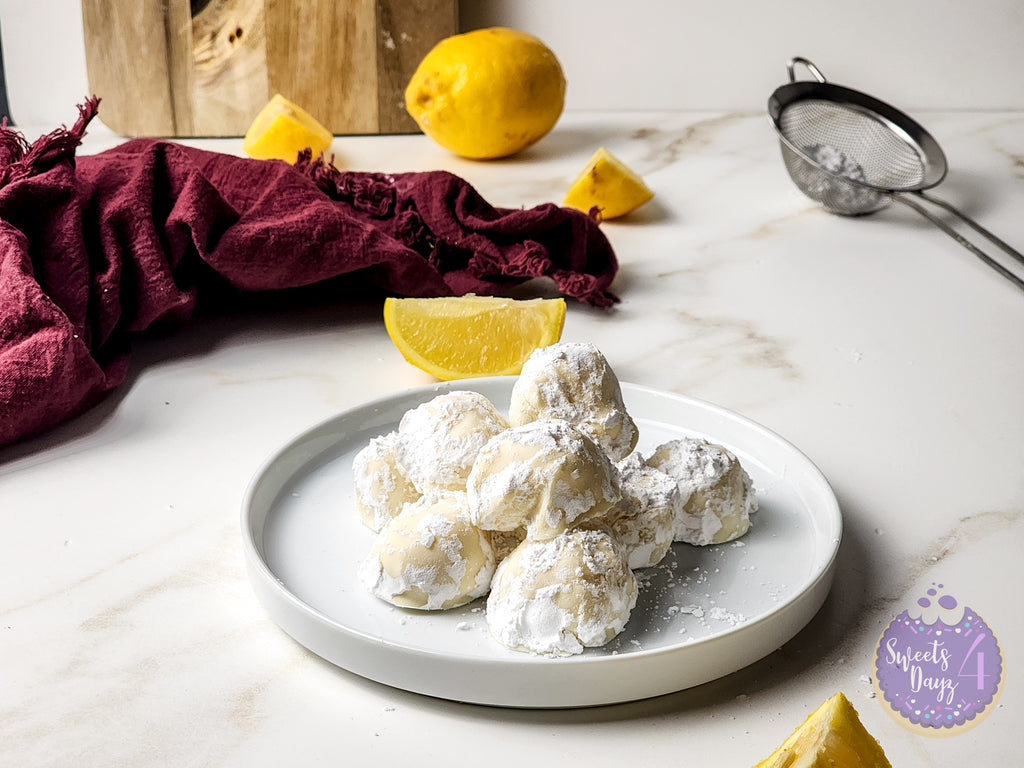 Lemon Bar Truffles on Gold Marble