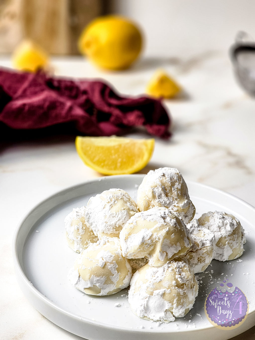 Lemon Bar Truffles on Gold Marble