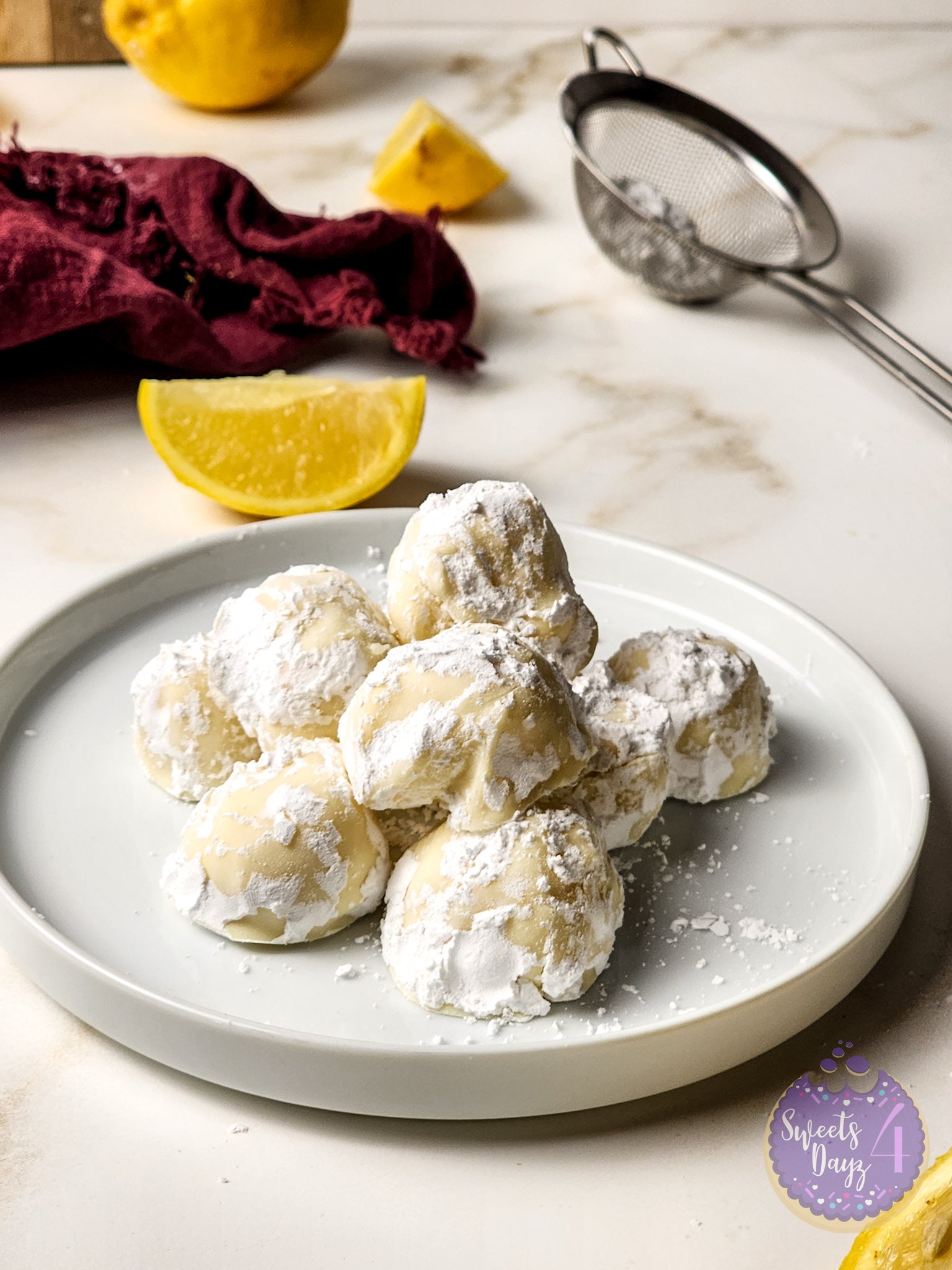 Lemon Bar Truffles on Gold Marble
