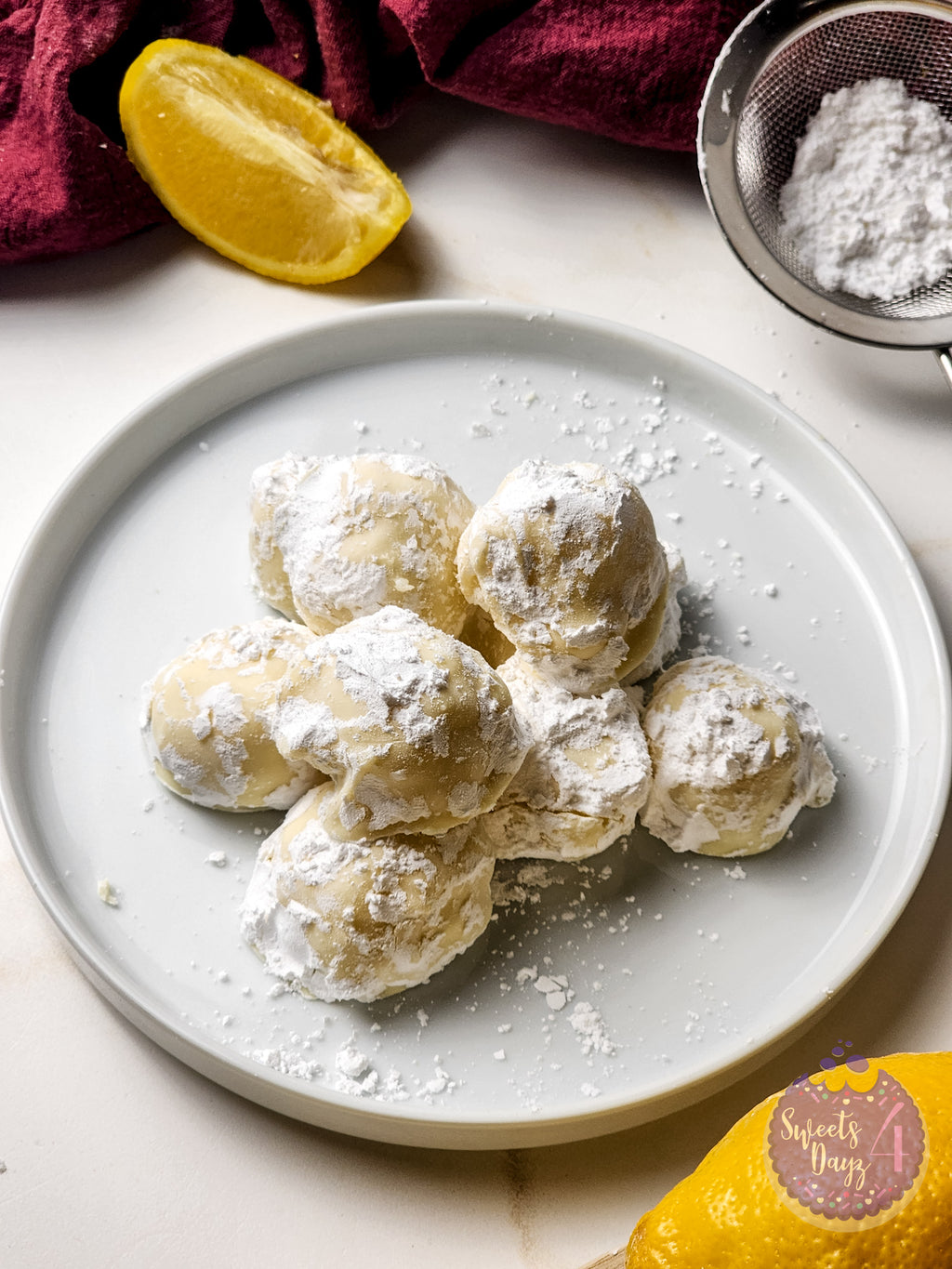 Lemon Bar Truffles on Gold Marble