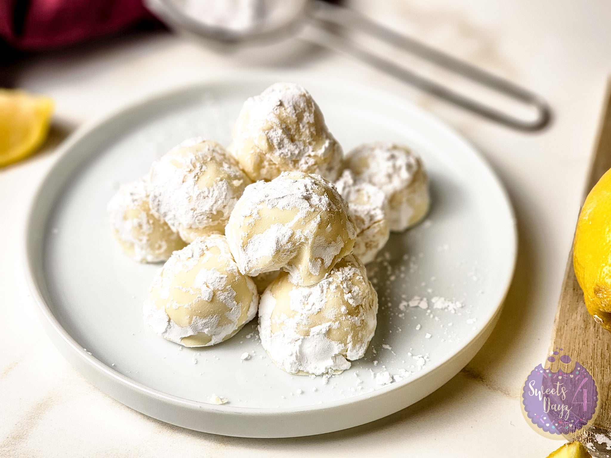 Lemon Bar Truffles on Gold Marble