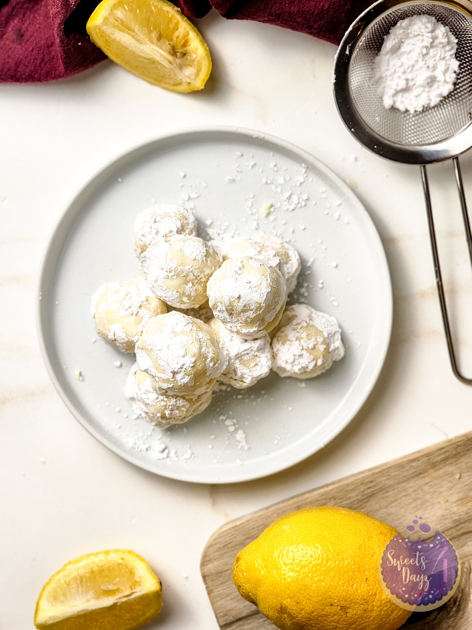 Lemon Bar Truffles on Gold Marble