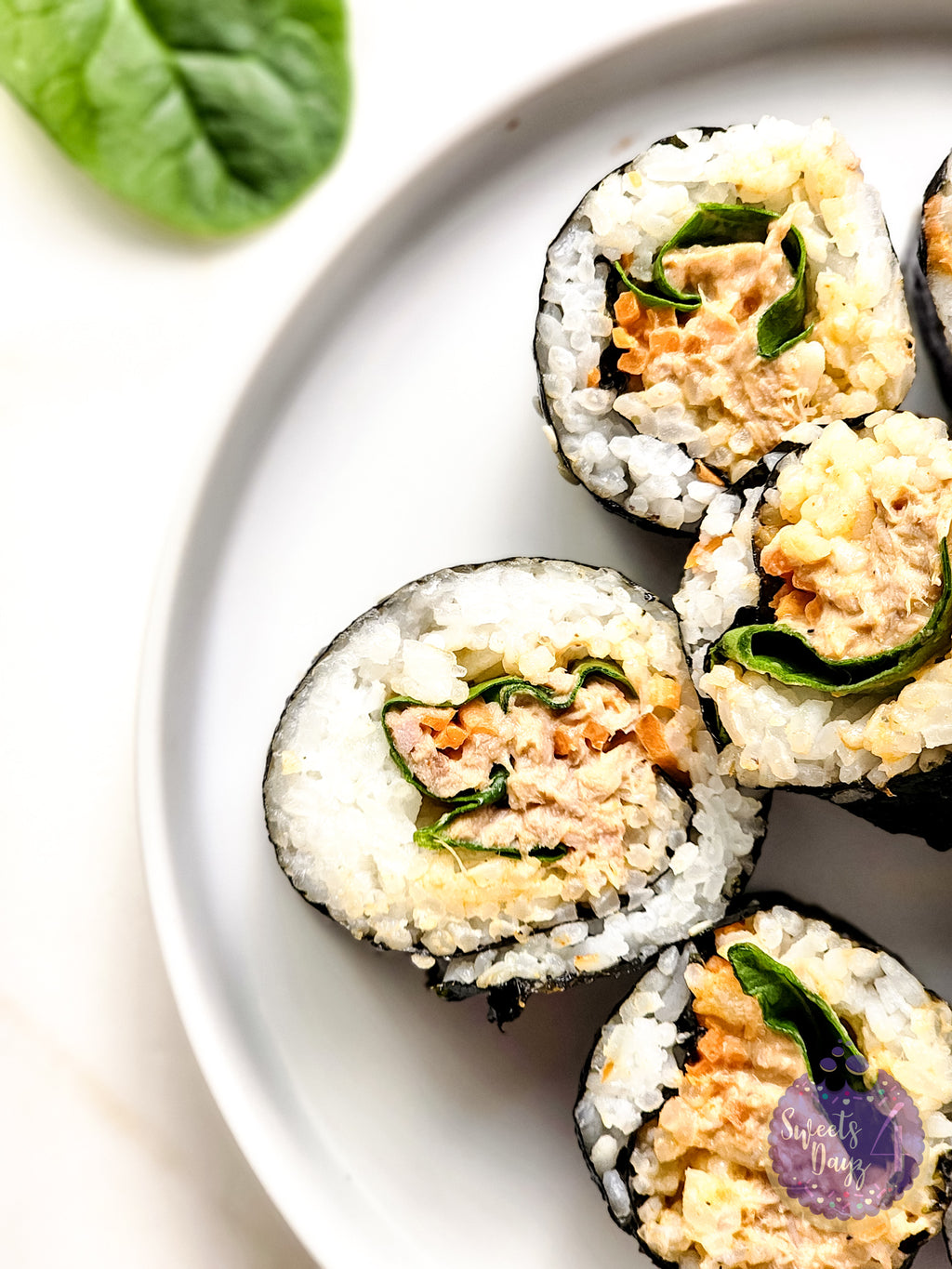 Spicy Tuna Kimbap Rolls on Gold Marble