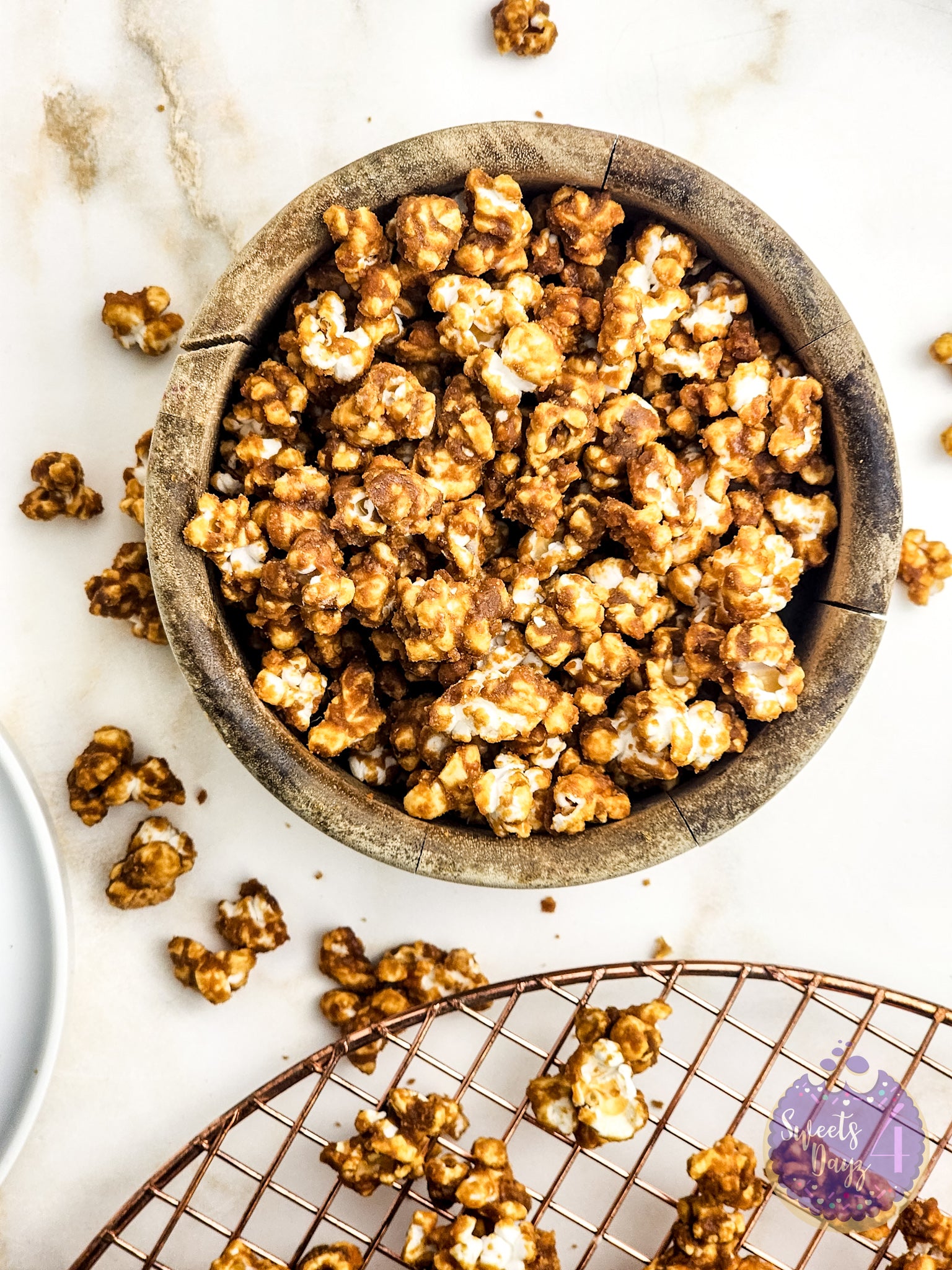 Homemade Caramel Popcorn on Gold Marble