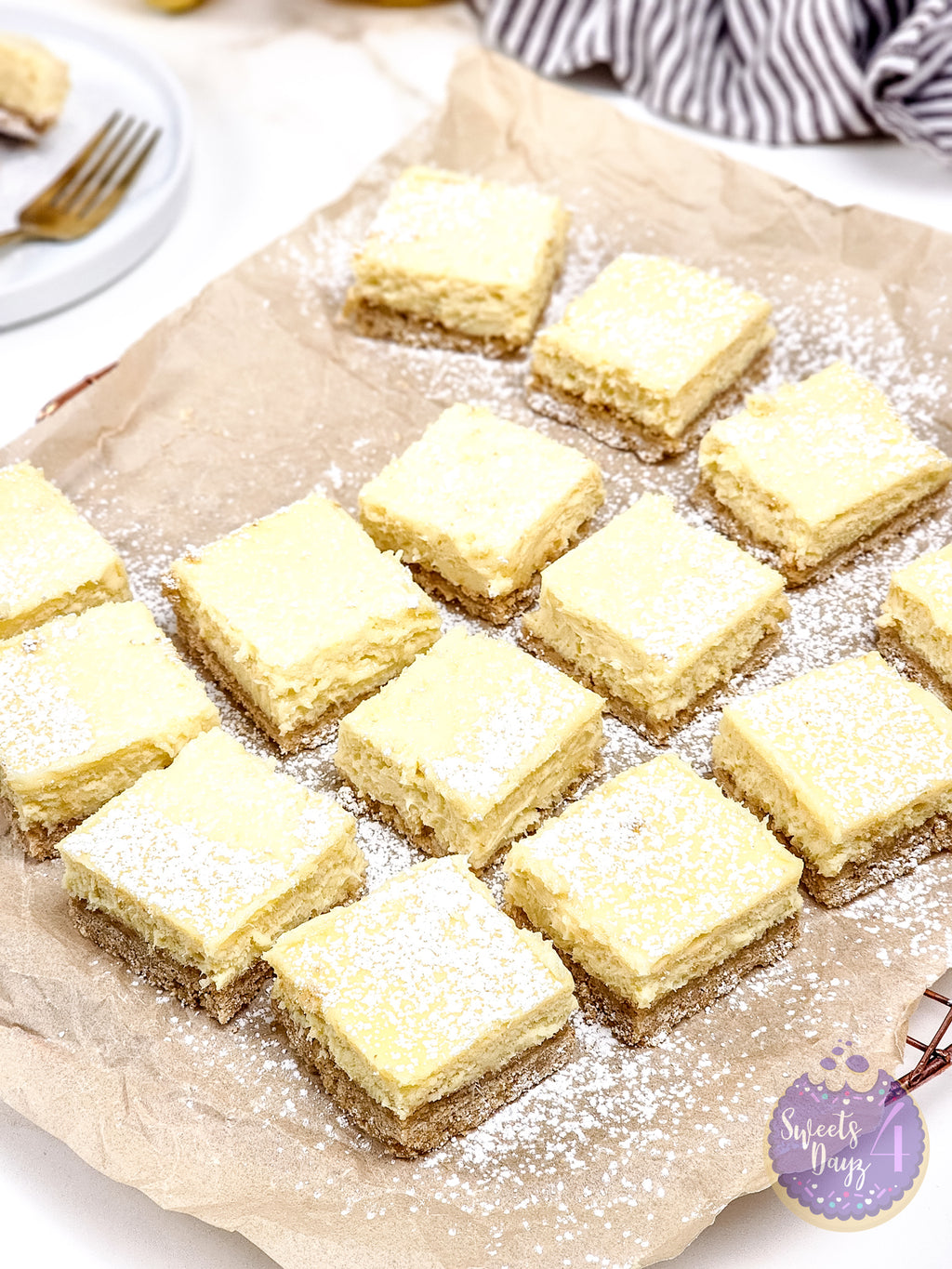 Lemon Cheesecake Bars on Gold Marble