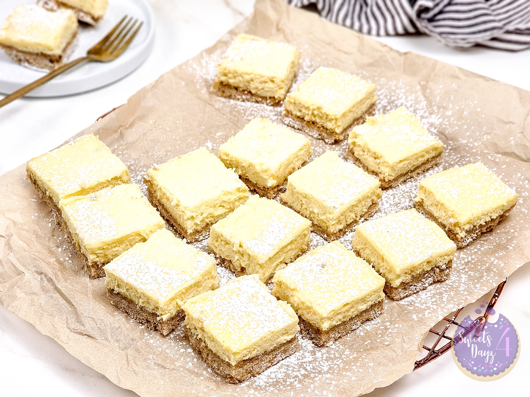Lemon Cheesecake Bars on Gold Marble