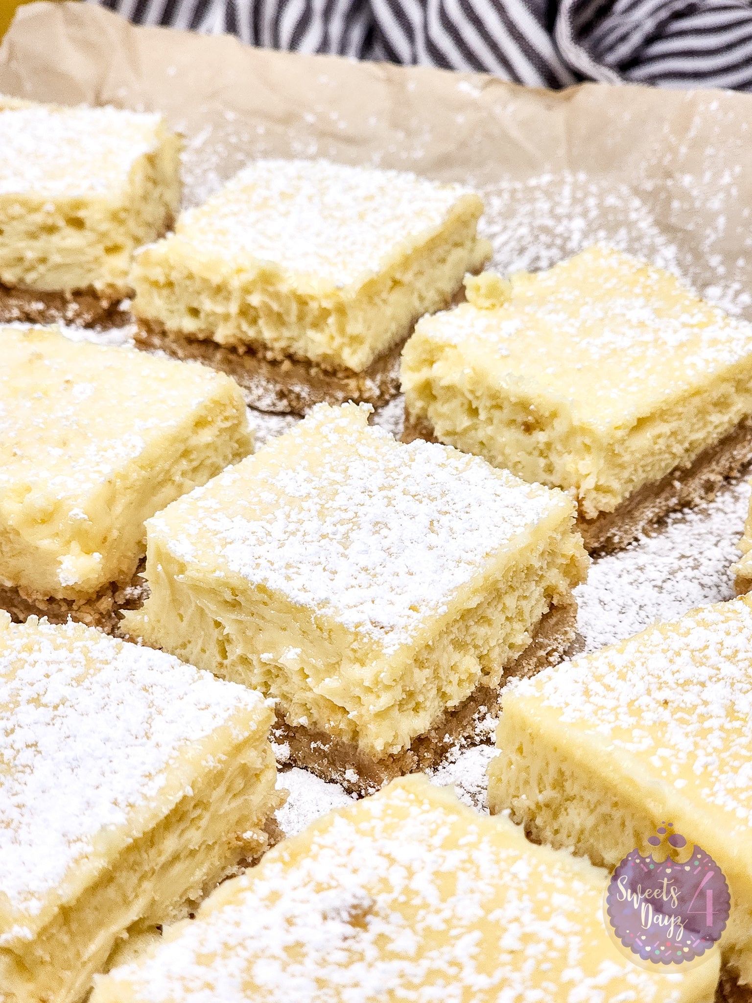 Lemon Cheesecake Bars on Gold Marble
