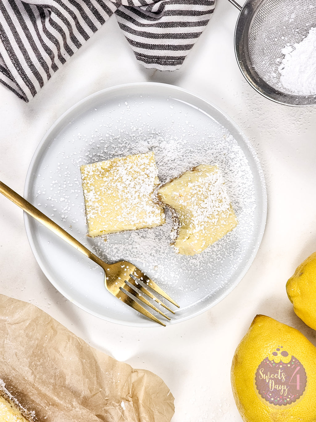 Lemon Cheesecake Bars on Gold Marble