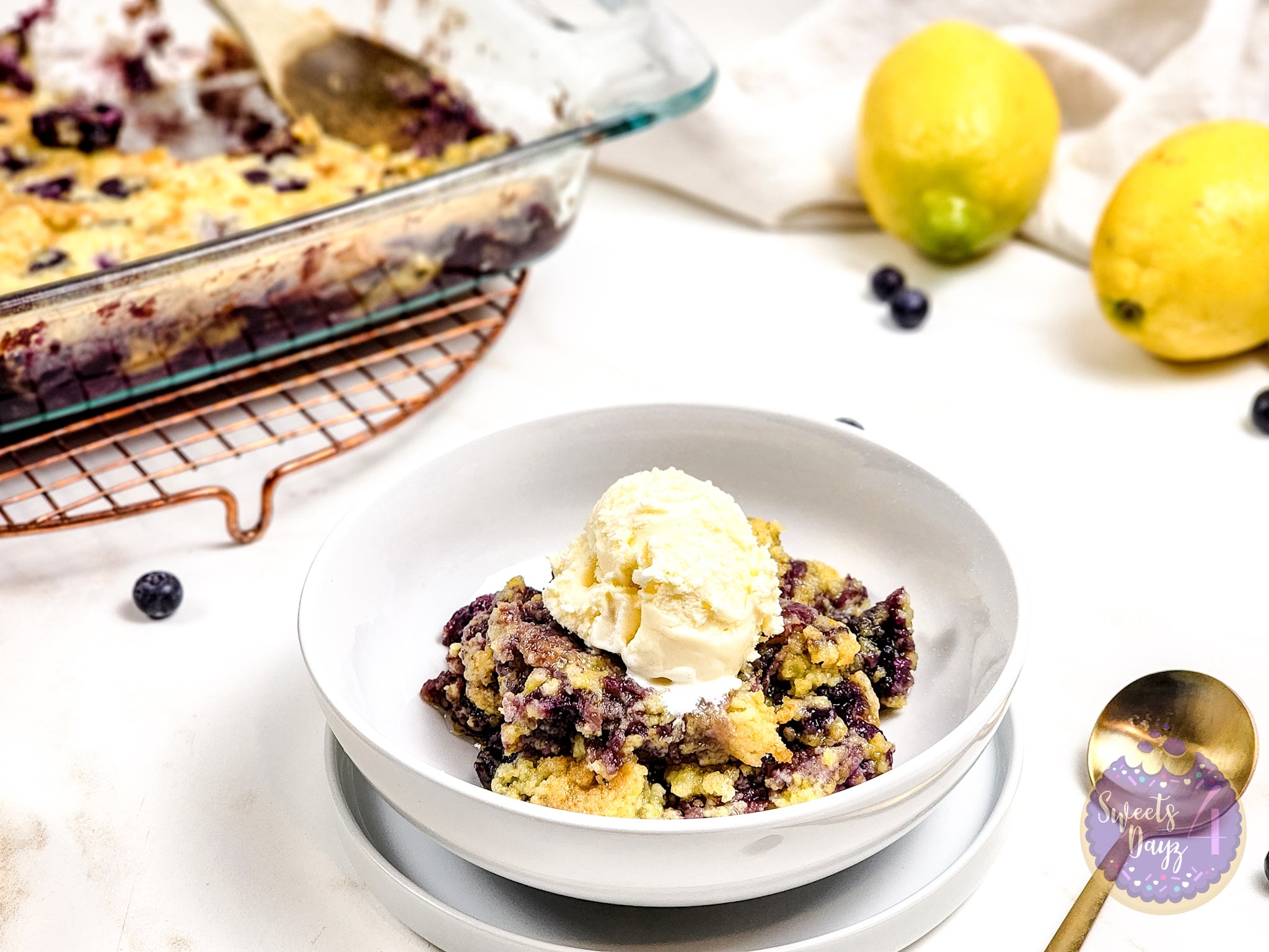 Lemon Blueberry Dump Cake on Gold Marble