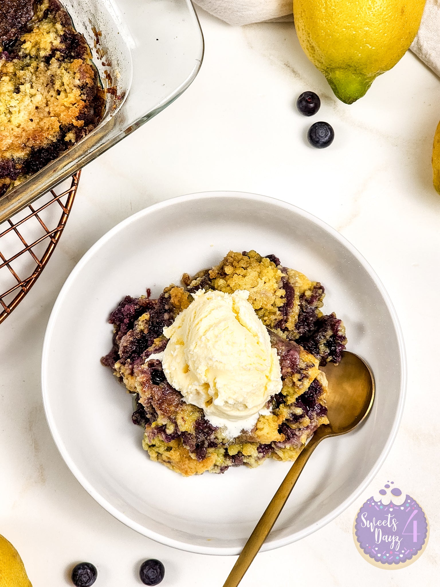 Lemon Blueberry Dump Cake on Gold Marble