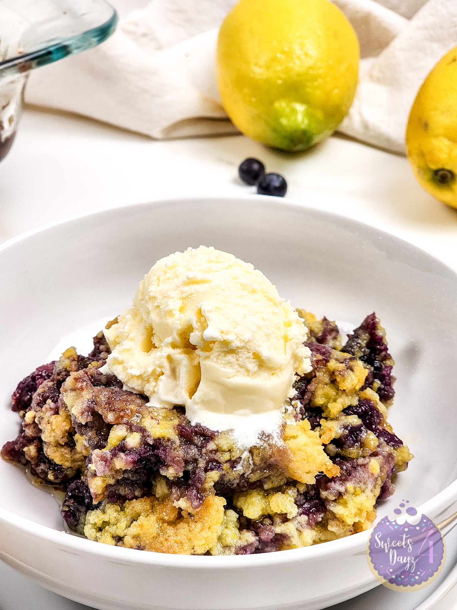 Lemon Blueberry Dump Cake on Gold Marble