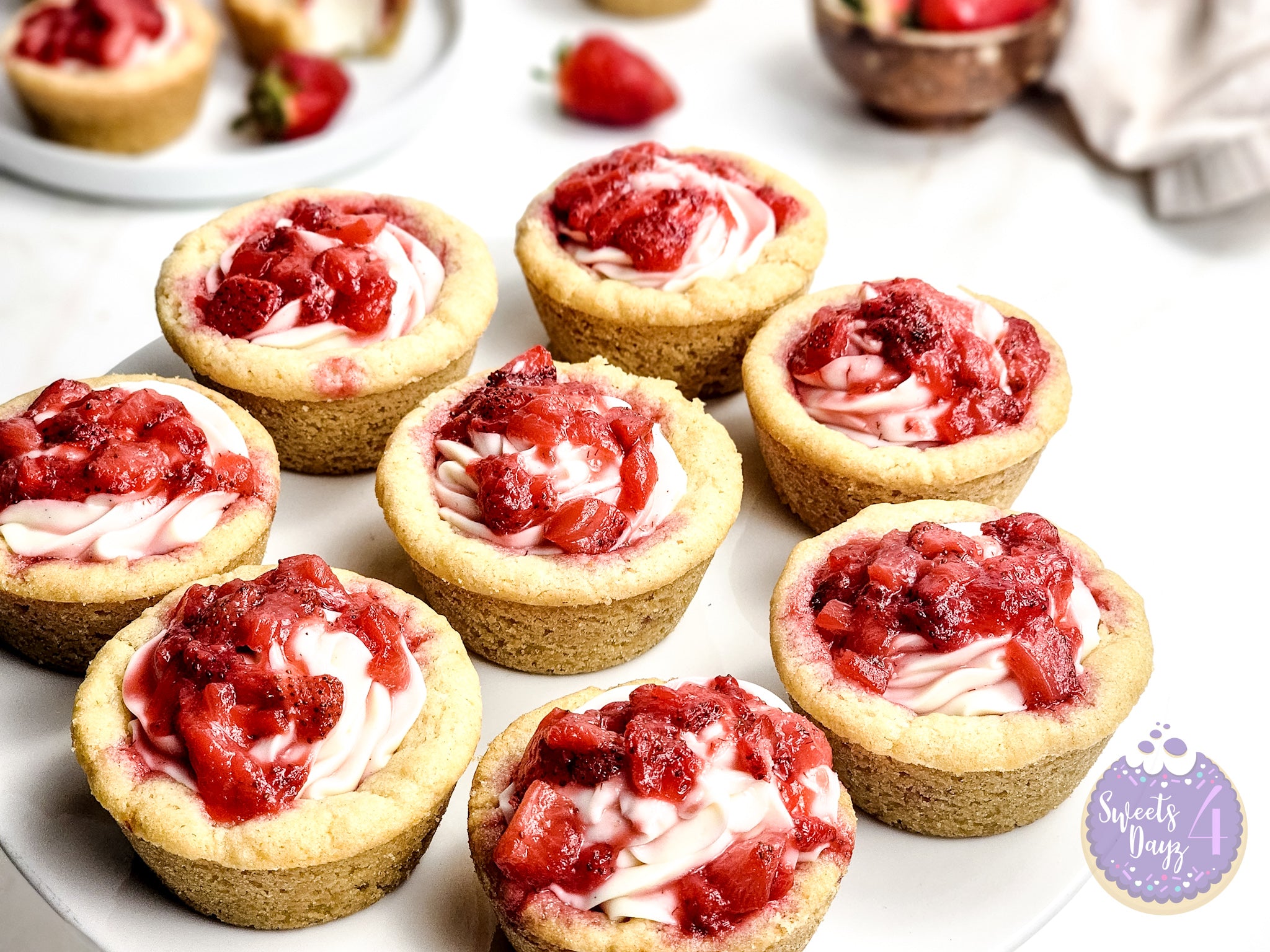 Strawberry Cheesecake Cookie Cups on Gold Marble