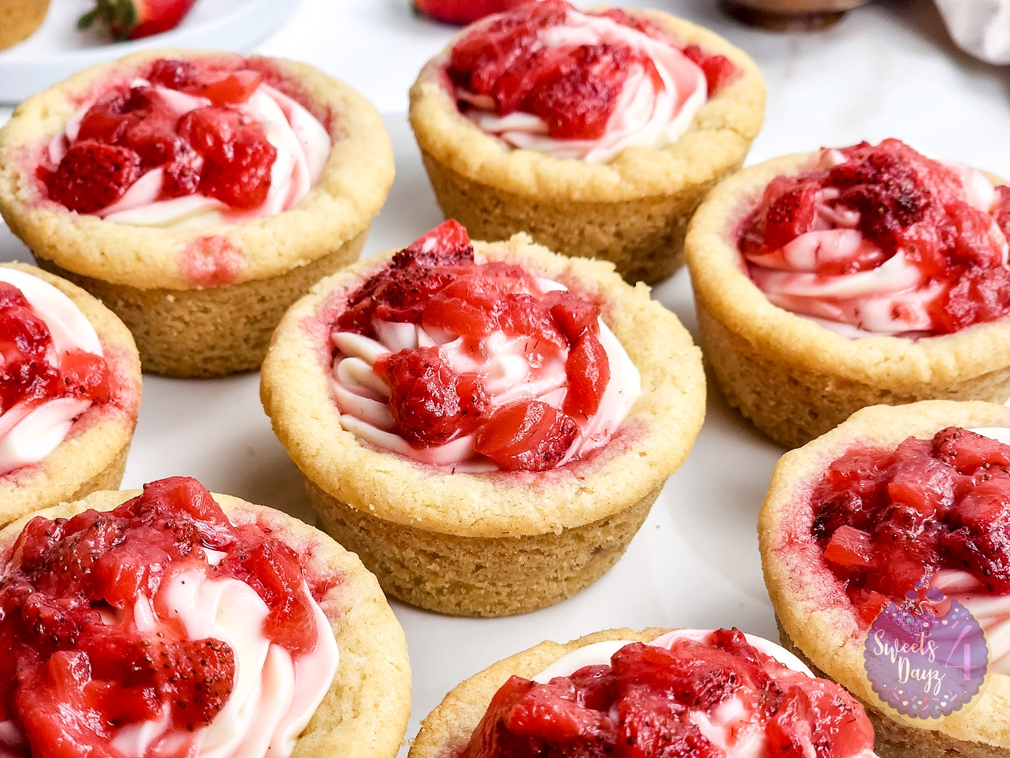 Strawberry Cheesecake Cookie Cups on Gold Marble