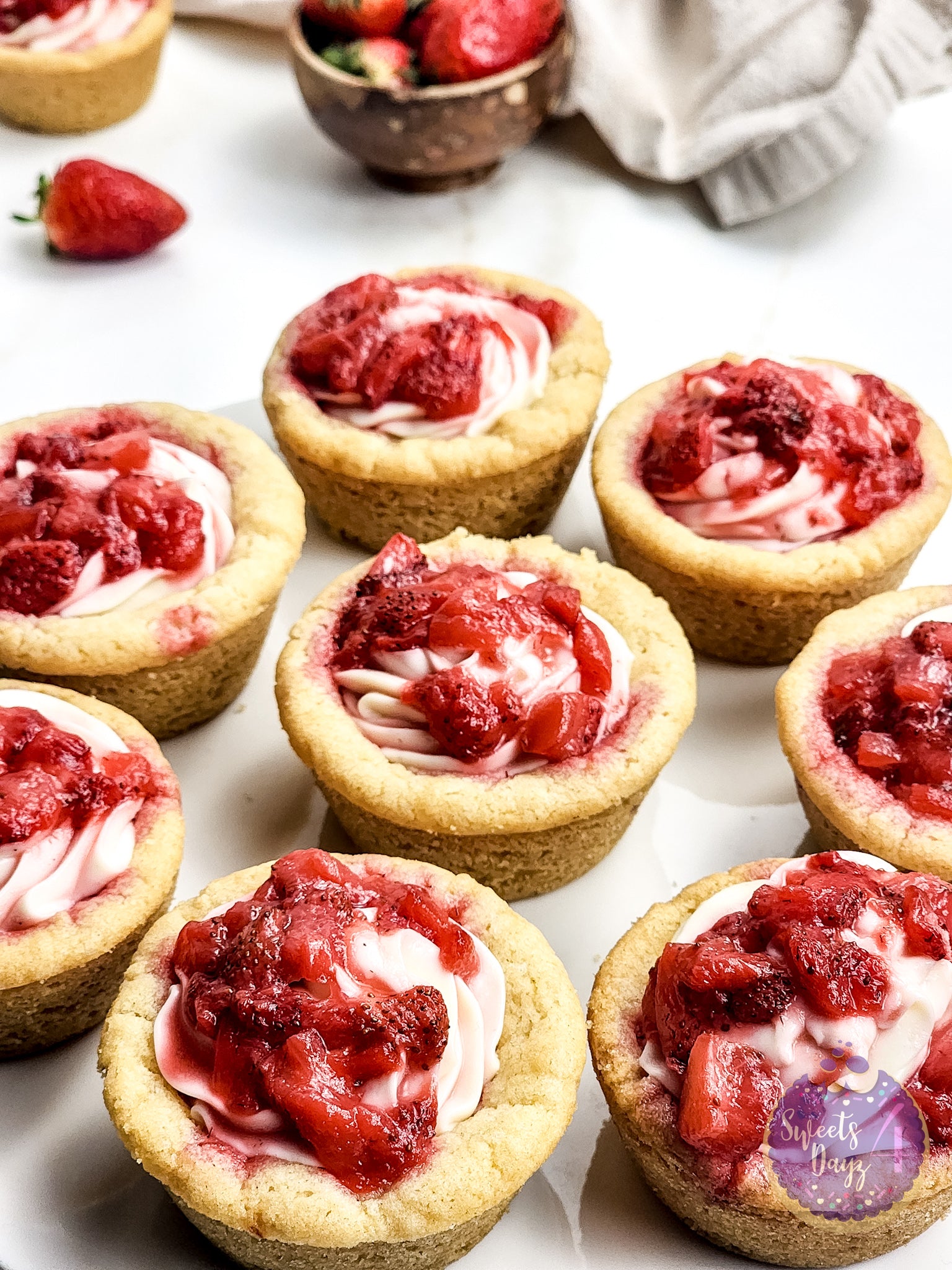Strawberry Cheesecake Cookie Cups on Gold Marble