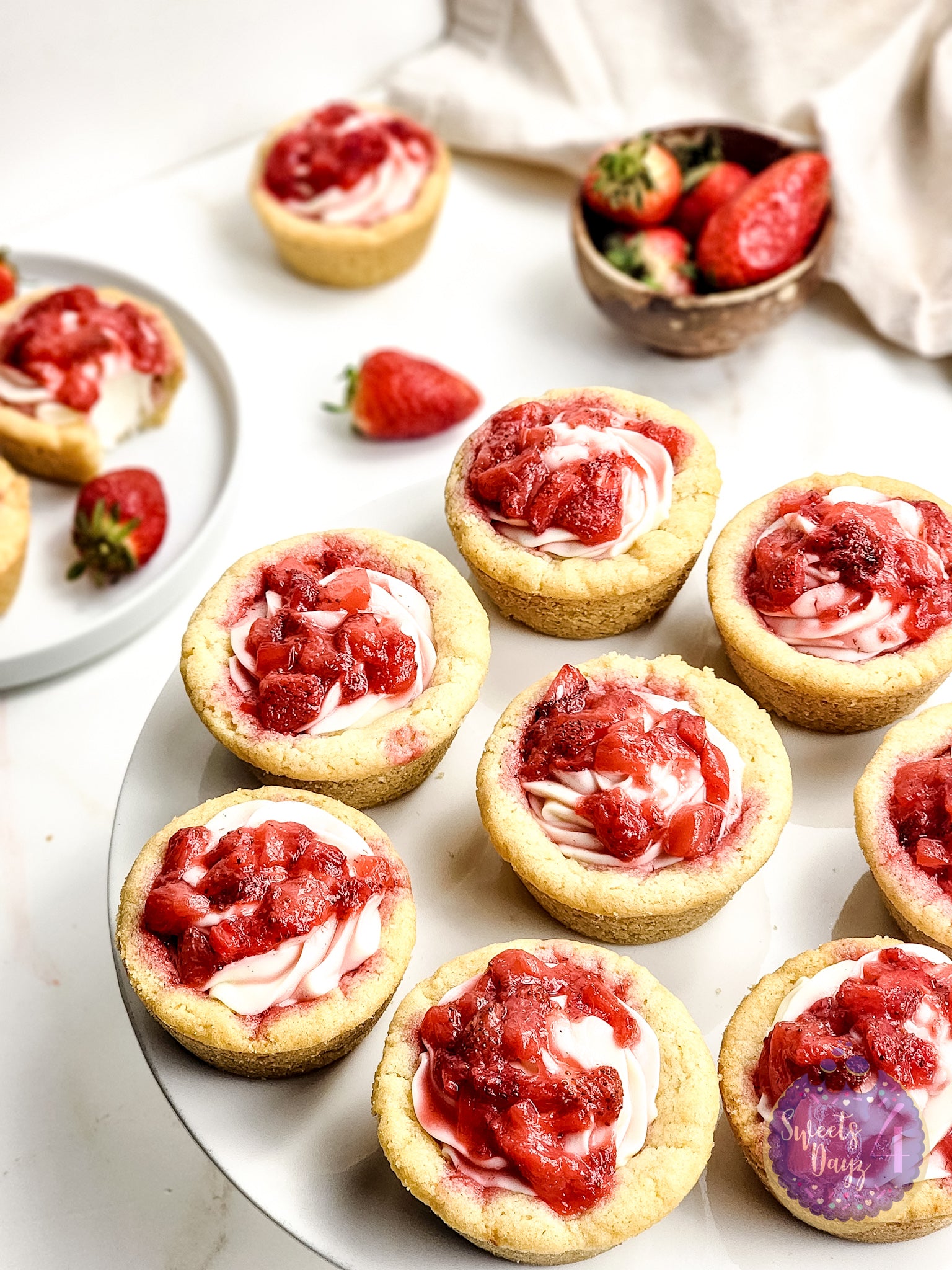 Strawberry Cheesecake Cookie Cups on Gold Marble