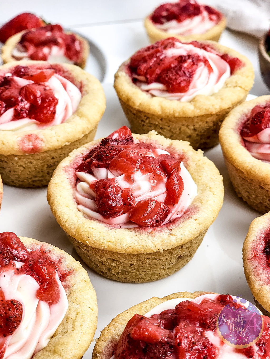 Strawberry Cheesecake Cookie Cups on Gold Marble