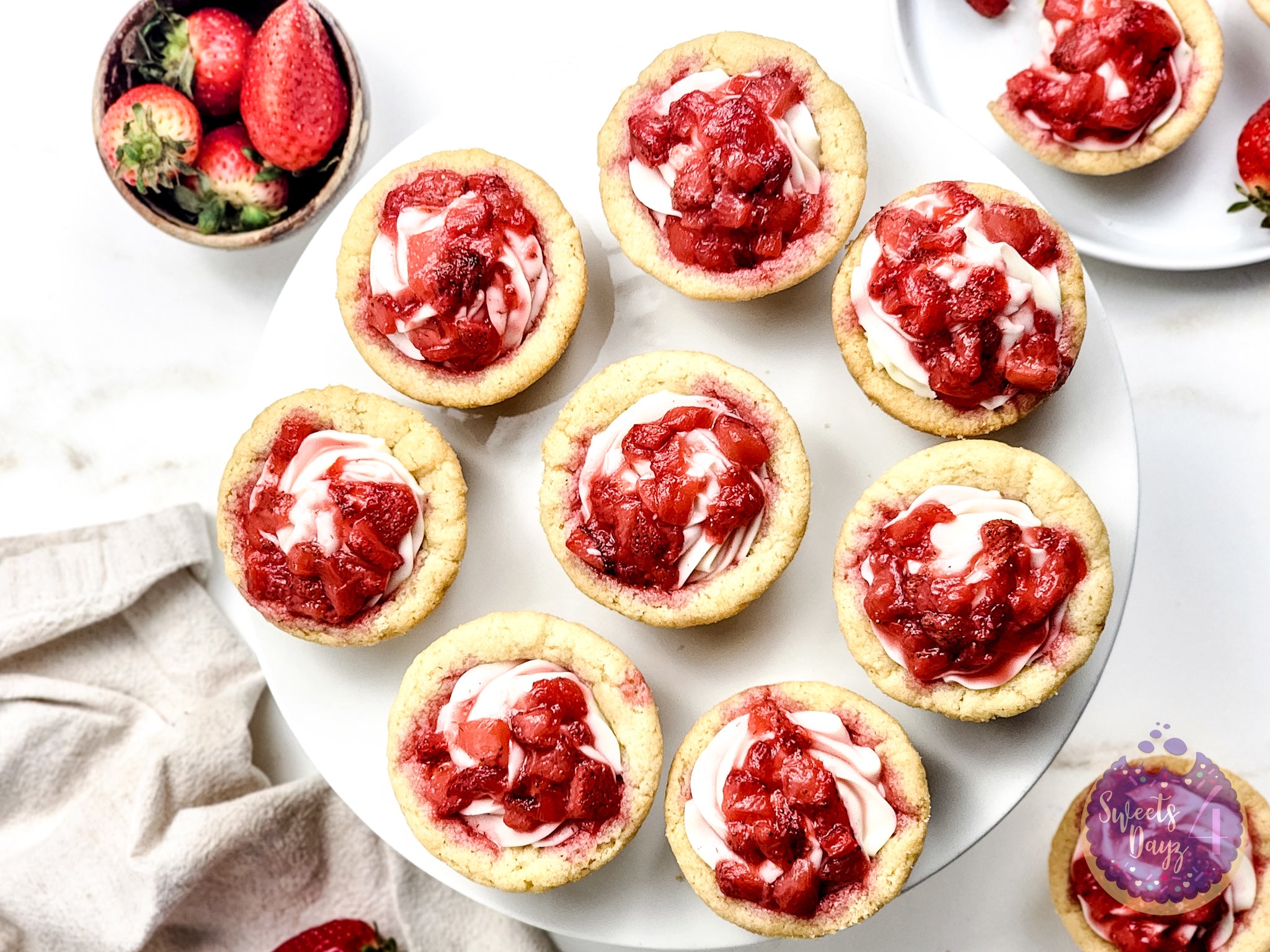 Strawberry Cheesecake Cookie Cups on Gold Marble