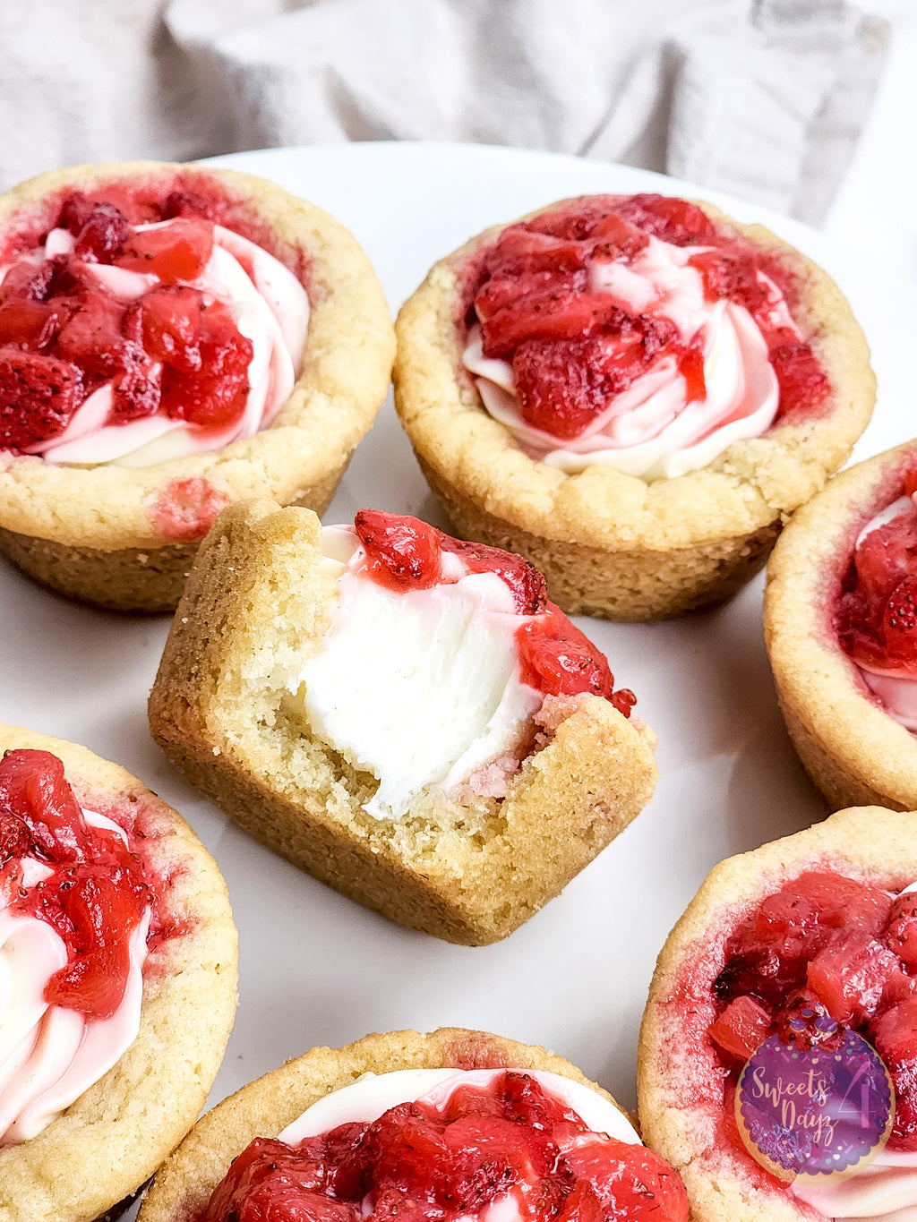 Strawberry Cheesecake Cookie Cups on Gold Marble