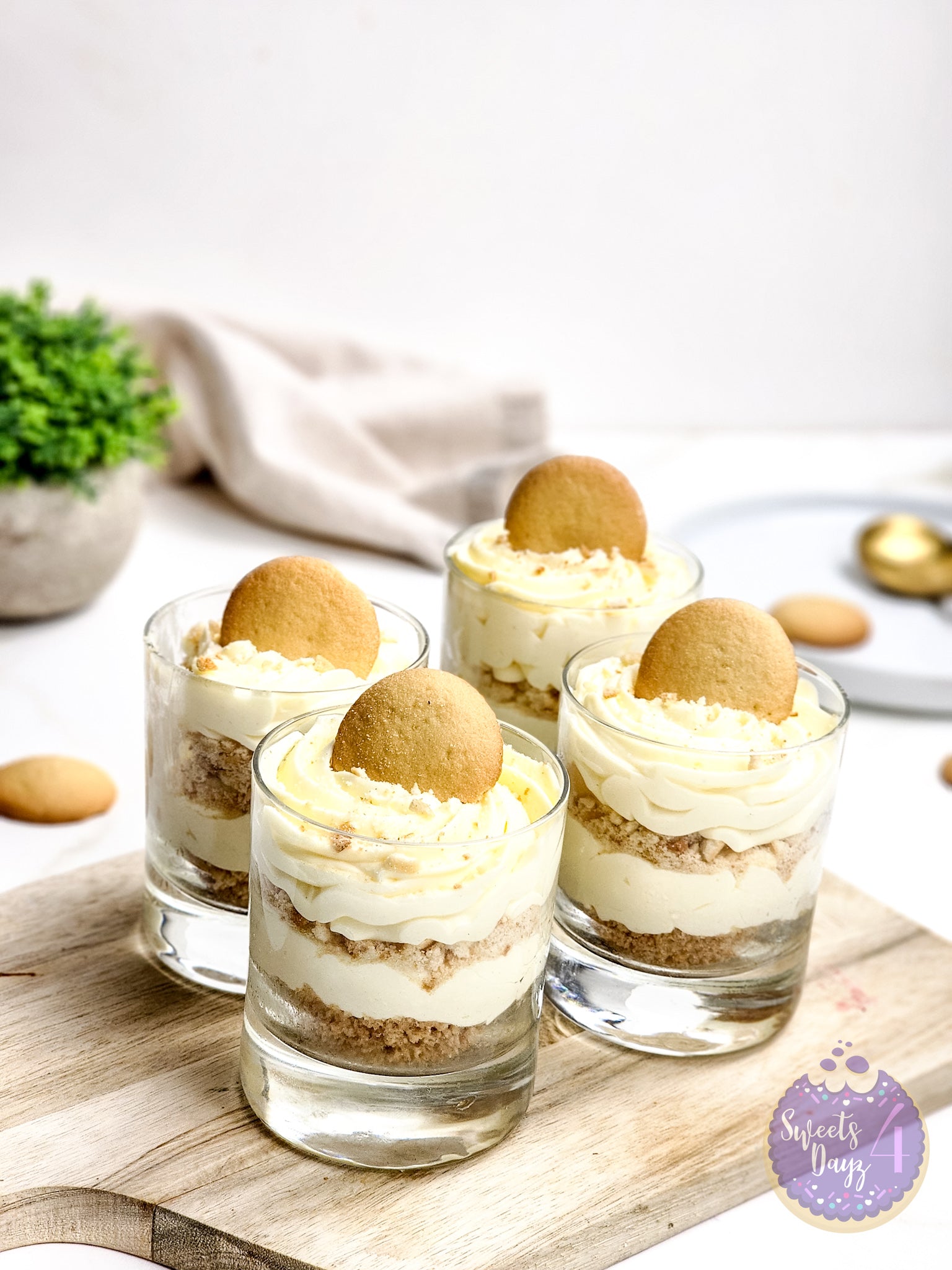 No Bake Vanilla Cheesecake Cups on Gold Marble