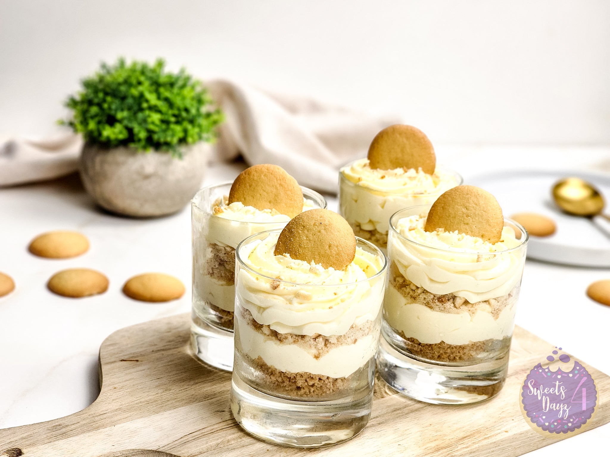 No Bake Vanilla Cheesecake Cups on Gold Marble