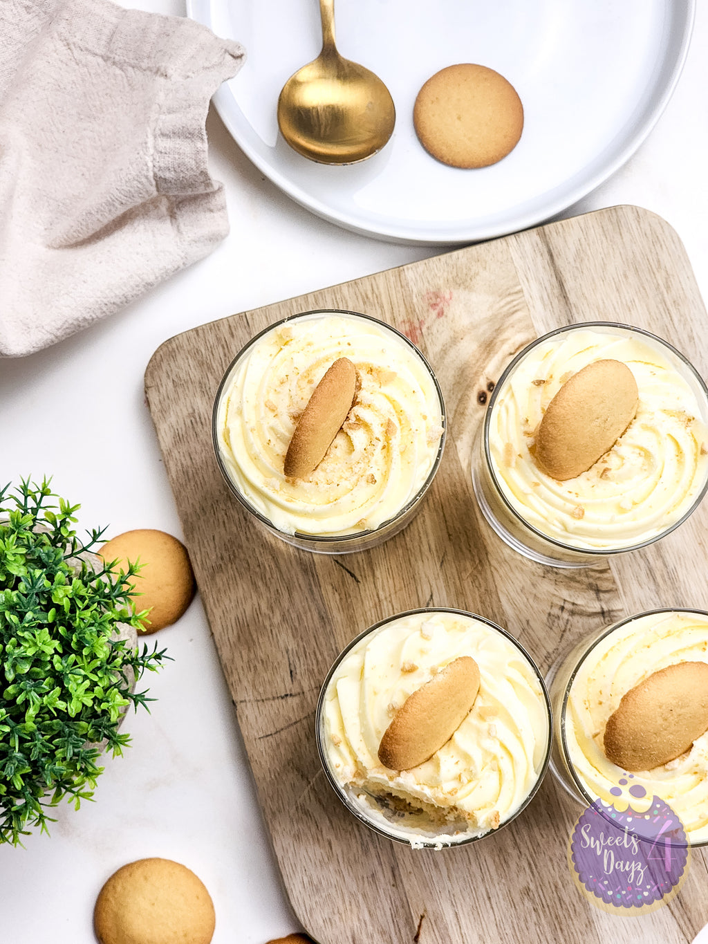 No Bake Vanilla Cheesecake Cups on Gold Marble