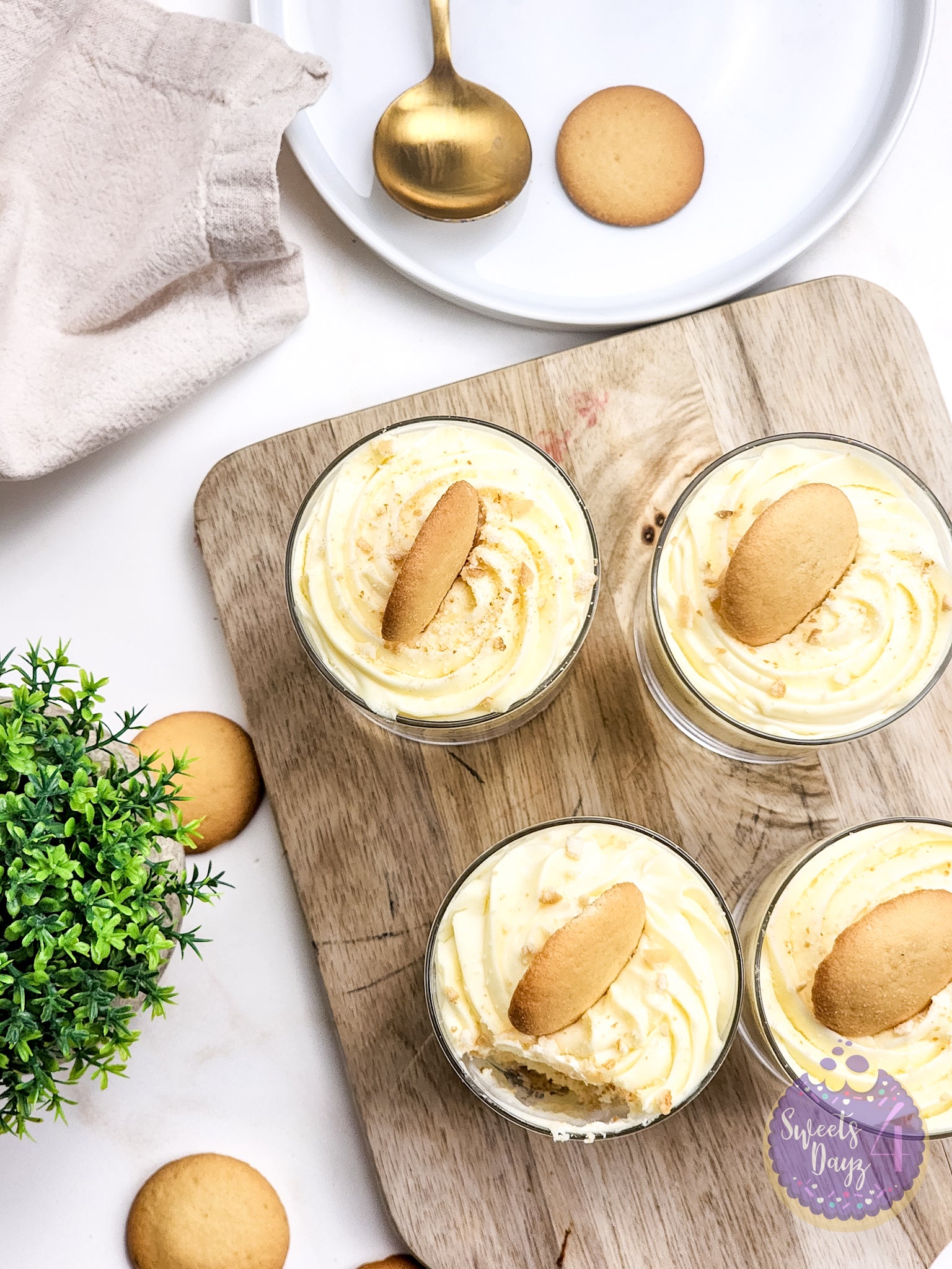 No Bake Vanilla Cheesecake Cups on Gold Marble