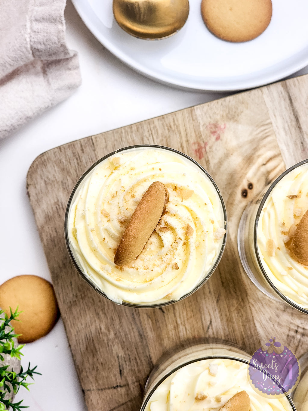 No Bake Vanilla Cheesecake Cups on Gold Marble