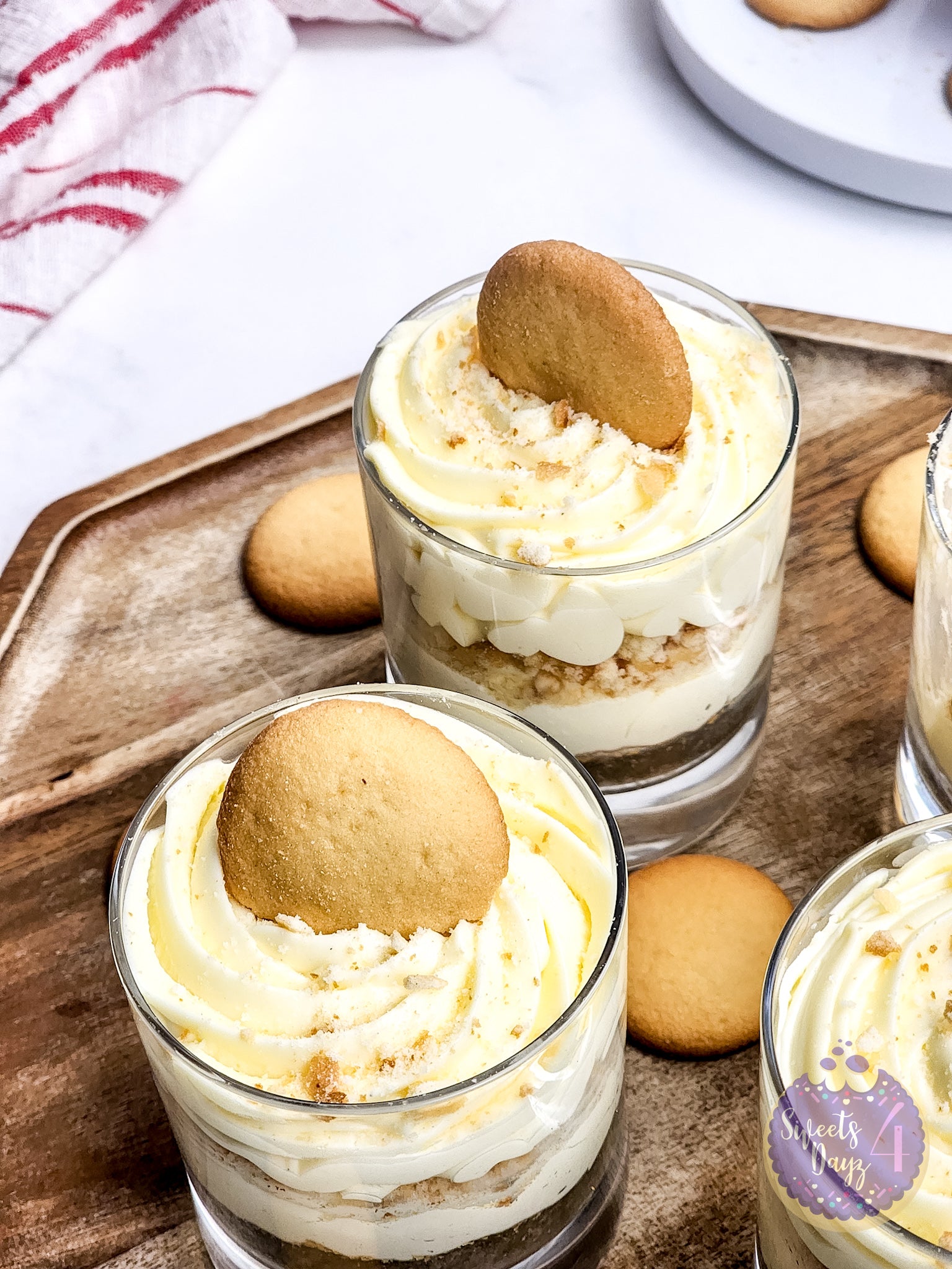 No Bake Vanilla Cheesecake Cups on Marble