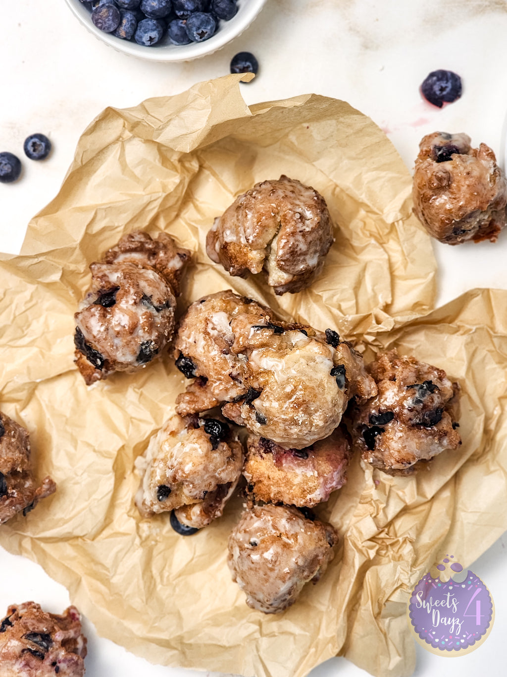Blueberry Donut Holes on Gold Marble