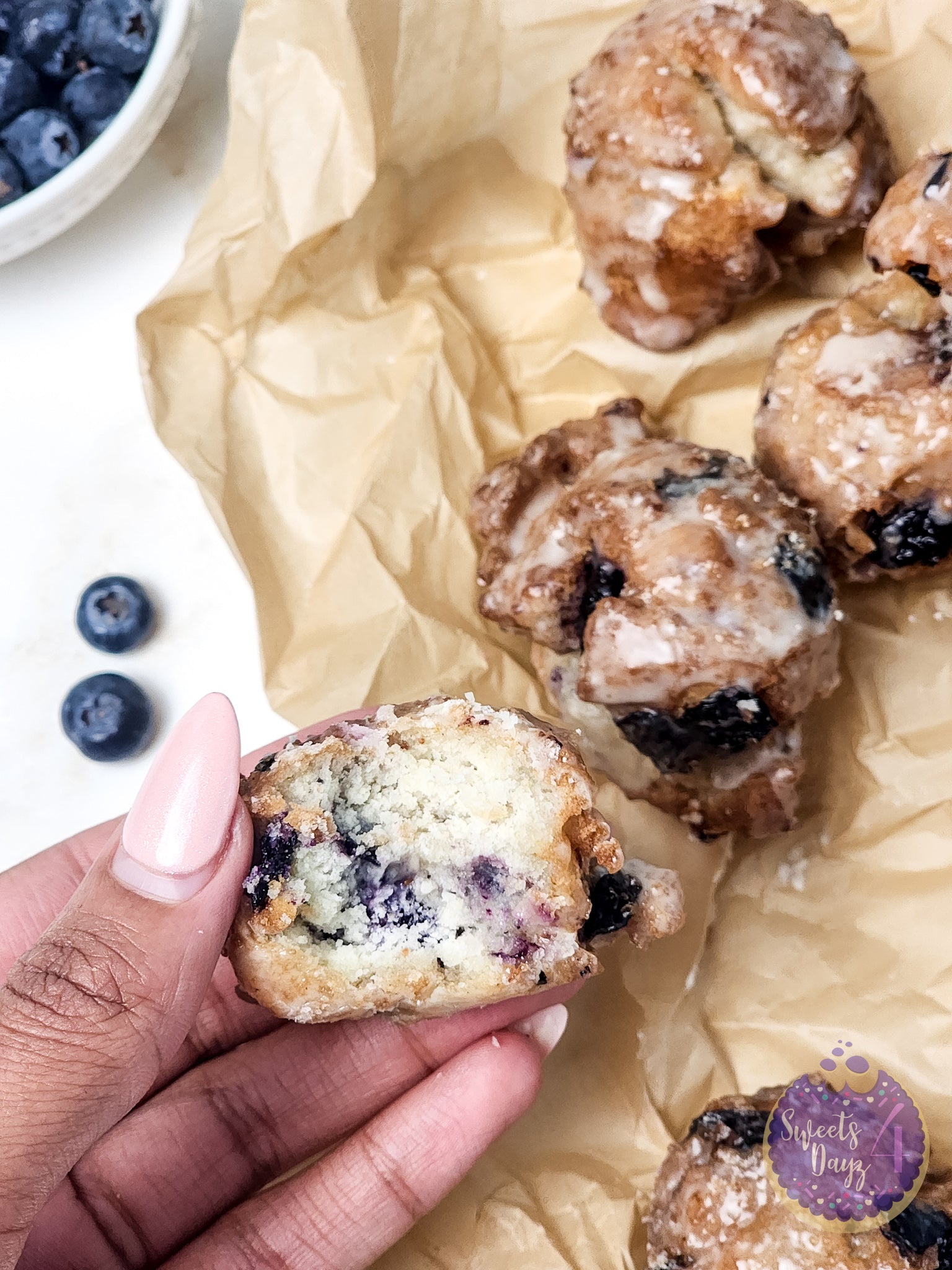 Blueberry Donut Holes on Gold Marble