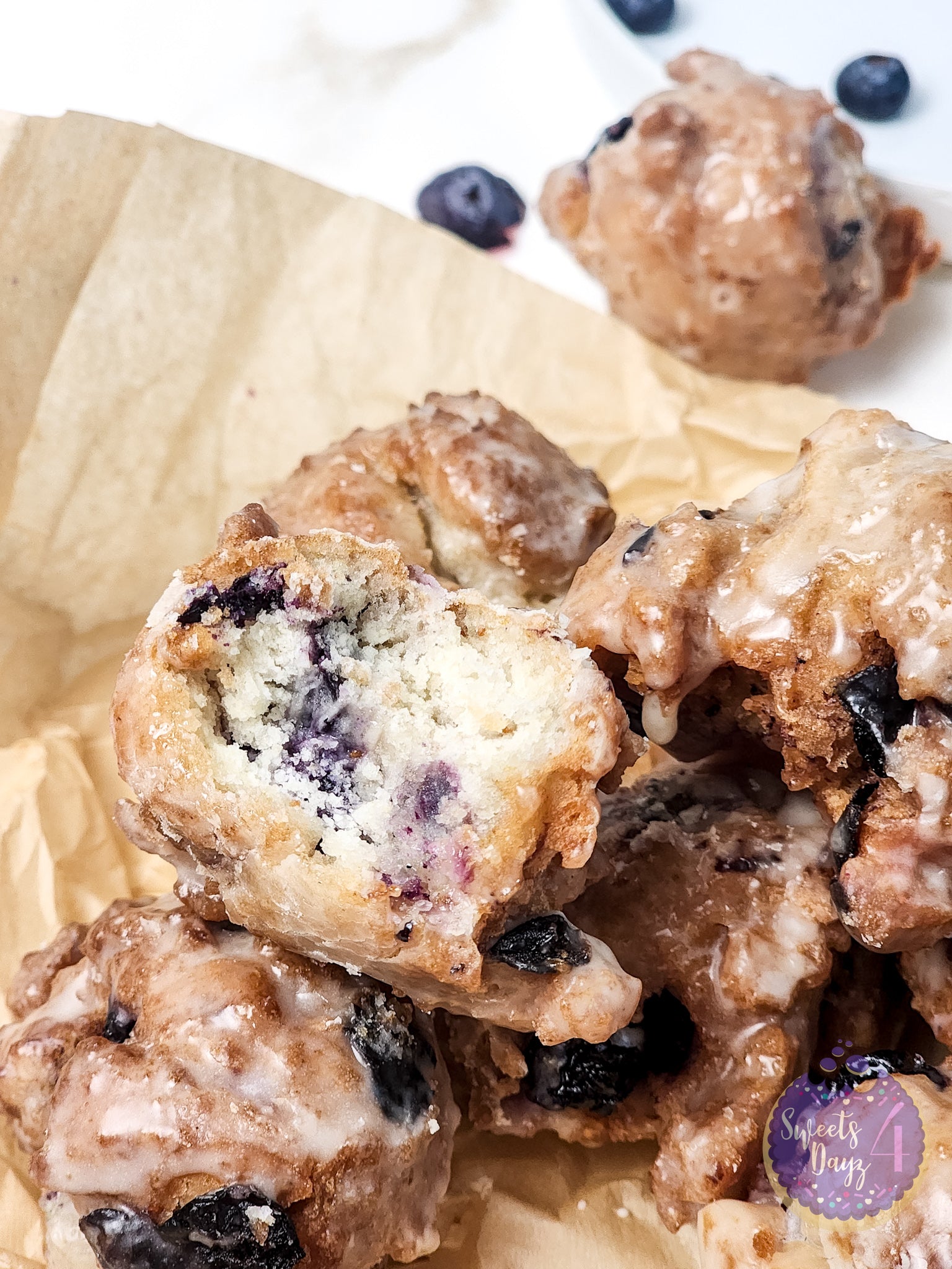 Blueberry Donut Holes on Gold Marble