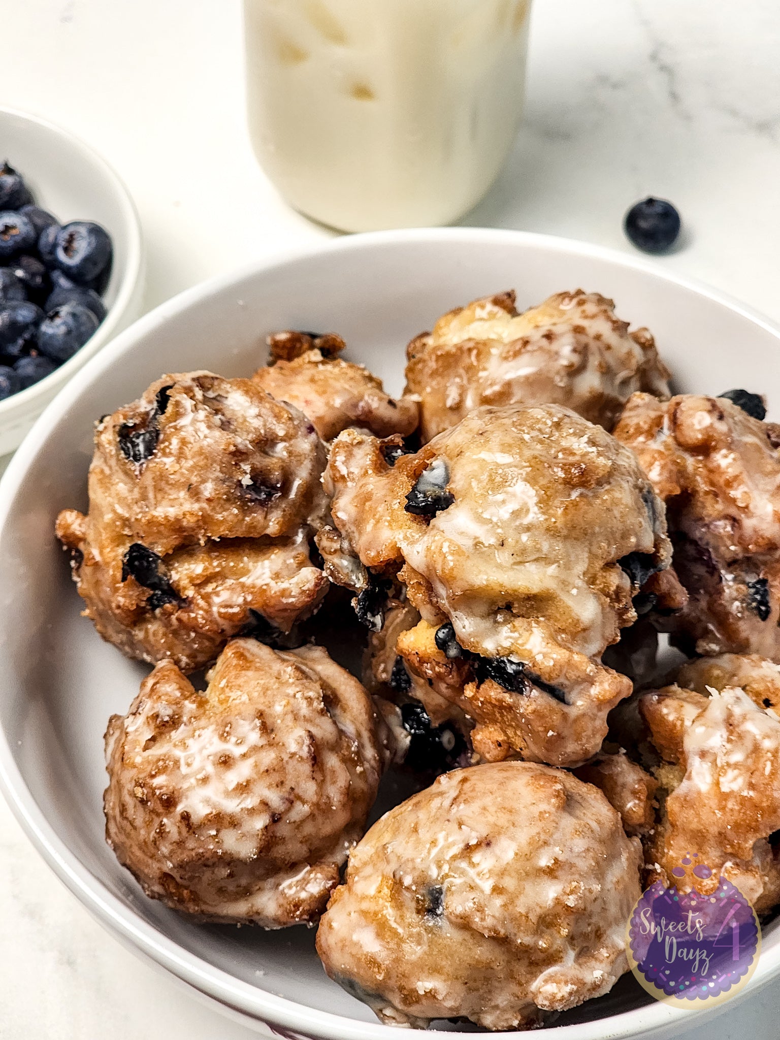 Blueberry Donut Holes on Marble