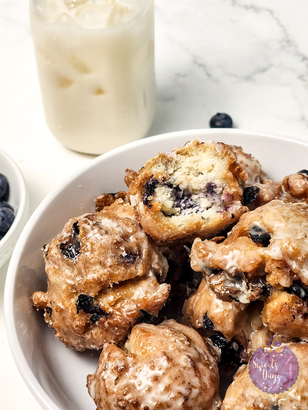 Blueberry Donut Holes on Marble