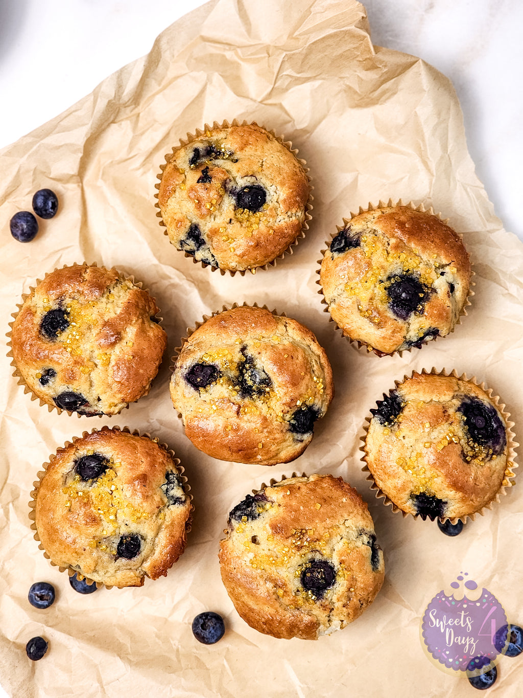 Protein Blueberry Muffins on Gold Marble