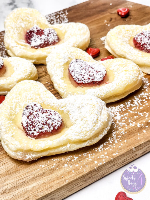 Cream Cheese Heart Puff Pastries on Marble - Image 8