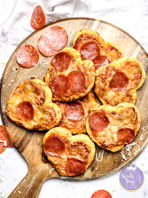 Mini Heart Pizzas on Marble - Image 5